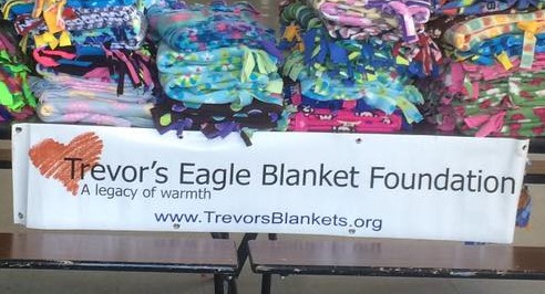 Picture of blankets made by Las Trampas clients for Trevor’s Eagle Blanket Foundation